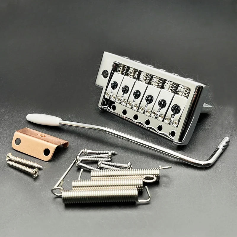 6-Sring Guitar Tremolo Bridge 84x42.5MM String Spacing 52.5MM(5x10.5MM) for ST Style Guitar Chrome Plated
6-Sring Guitar Tremolo Bridge 84x42.5MM String Spacing 52.5MM(5x10.5MM) for ST Style Guitar Chrome Plated