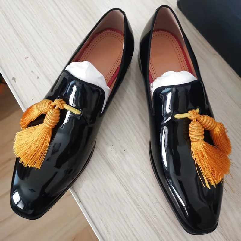 Men's Black Patent Leather Loafers with Big Tassels Handmade Red Sole Slip-on Dress Shoes for Party And Banquet
Men's Black Patent Leather Loafers with Big Tassels Handmade Red Sole Slip-on Dress Shoes for Party And Banquet