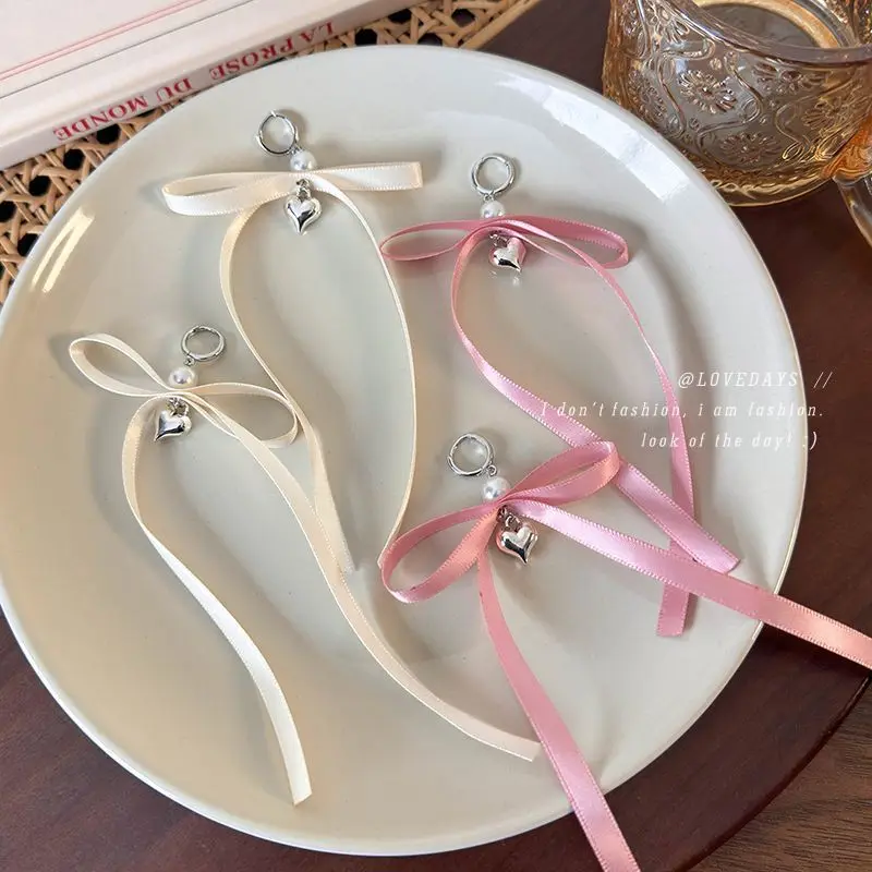 Ribbon Bow Heart Pendant Earrings for Girls Pink Pearl Ear Cuff Sweet Satin Design Portable Daily Wear for Office Wedding Travel
Ribbon Bow Heart Pendant Earrings for Girls Pink Pearl Ear Cuff Sweet Satin Design Portable Daily Wear for Office Wedding Travel
