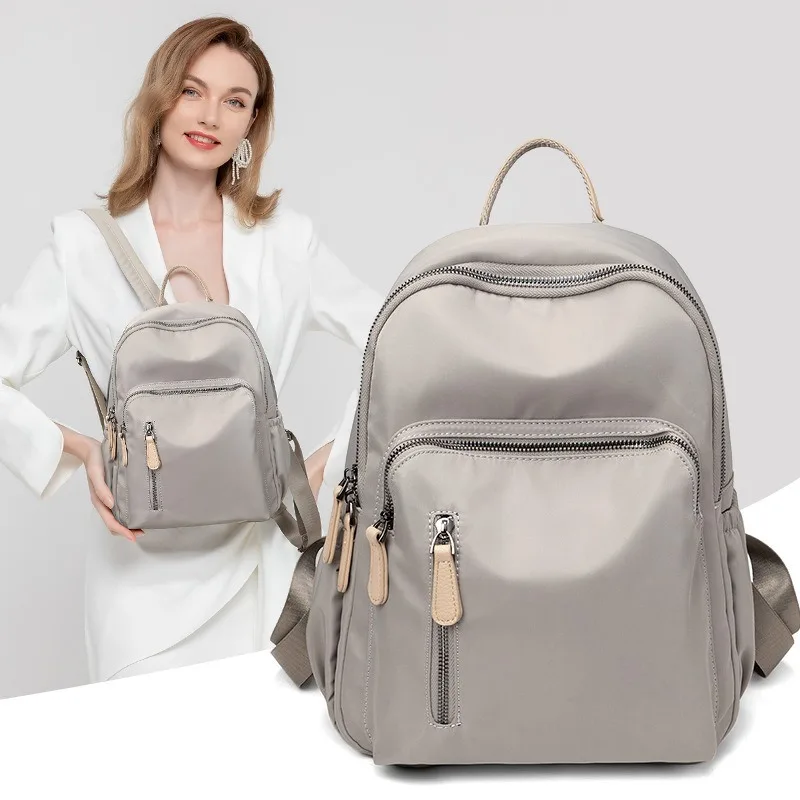 Korean-style women's backpack, a fresh and large-capacity schoolbag fashion travel bag made of nylon Oxford fabric
Korean-style women's backpack, a fresh and large-capacity schoolbag fashion travel bag made of nylon Oxford fabric