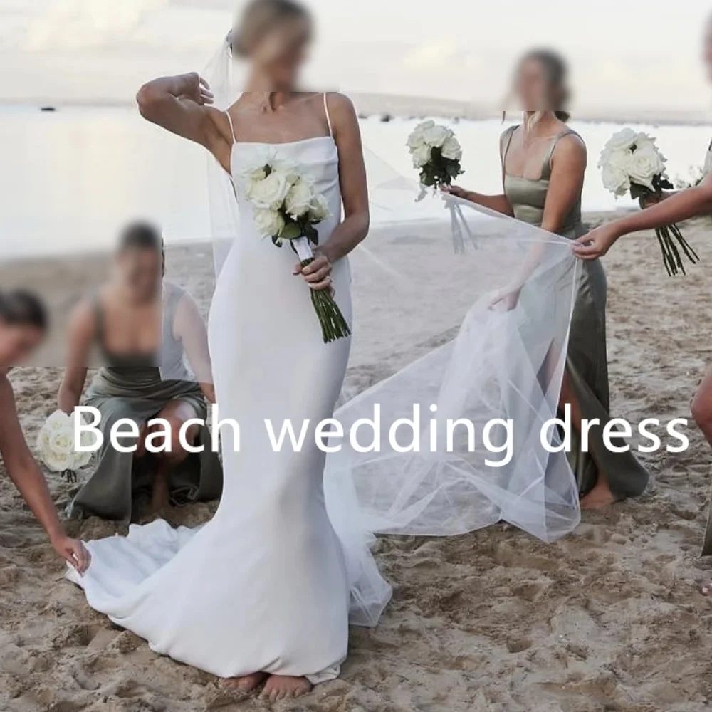 Beach Wedding Dress Customized Satin Spaghetti Strap Mermaid Bridal Gowns Long Tails Robe De Mariee Backless Sleeveless Charming
Beach Wedding Dress Customized Satin Spaghetti Strap Mermaid Bridal Gowns Long Tails Robe De Mariee Backless Sleeveless Charming
