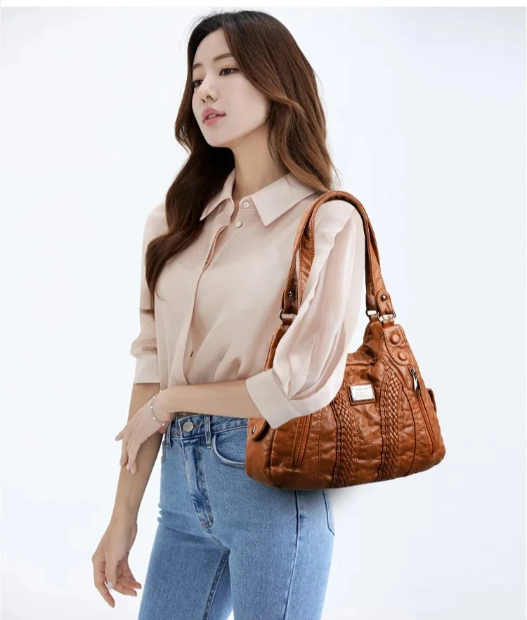 This women's fashionable washable leather tote bag has a large capacity and is versatile. It can be carried diagonally
This women's fashionable washable leather tote bag has a large capacity and is versatile. It can be carried diagonally