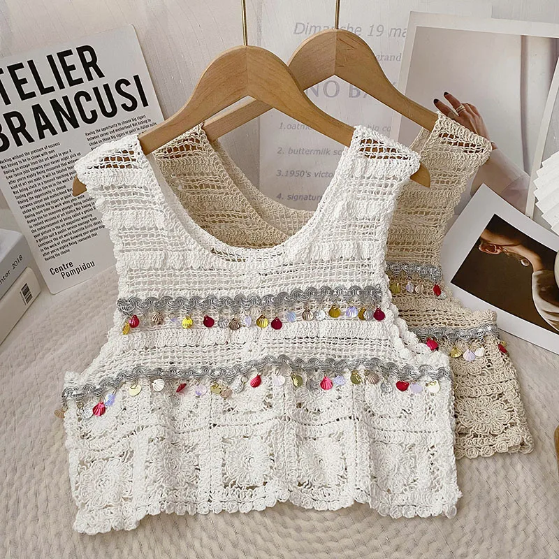 Boring Honey Round Collar Sleeveless Summer Clothes For Women Hollow Out Pearl Tassel Tank Top Retro Fashion Short Crop Tops
Boring Honey Round Collar Sleeveless Summer Clothes For Women Hollow Out Pearl Tassel Tank Top Retro Fashion Short Crop Tops