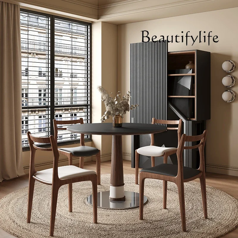 Medieval small apartment round rock slab dining table and chairs solid wood small round table high-end sense modern simplicity
Medieval small apartment round rock slab dining table and chairs solid wood small round table high-end sense modern simplicity