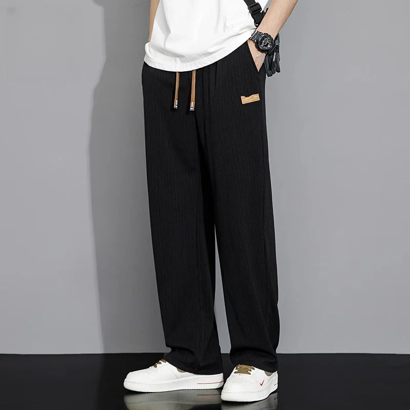 Мужские летние тонкие свободные повседневные брюки из ледяного шелка, модные эластичные прямые длинные брюки из Гонконга для молодежи
Мужские летние тонкие свободные повседневные брюки из ледяного шелка, модные эластичные прямые длинные брюки из Гонконга для молодежи