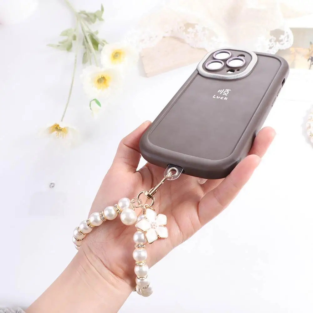 Модный жемчужный ремешок для мобильного телефона, анти-потерянный съемный шнур, ремешок для мобильного телефона с цветком, короткий ремешок для телефона, ювелирное изделие, подарок
Модный жемчужный ремешок для мобильного телефона, анти-потерянный съемный шнур, ремешок для мобильного телефона с цветком, короткий ремешок для телефона, ювелирное изделие, подарок