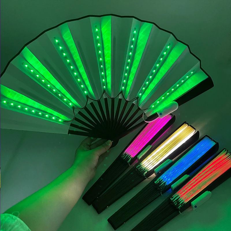 Holiday Carnival party lighting supplies LED neon light rave fan folding luminous fan wedding hand fan glowing in the party
Holiday Carnival party lighting supplies LED neon light rave fan folding luminous fan wedding hand fan glowing in the party