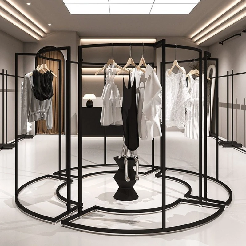 Clothing store curved middle island shelf with wrought iron black display rack in the middle, combined clothes display rack
Clothing store curved middle island shelf with wrought iron black display rack in the middle, combined clothes display rack