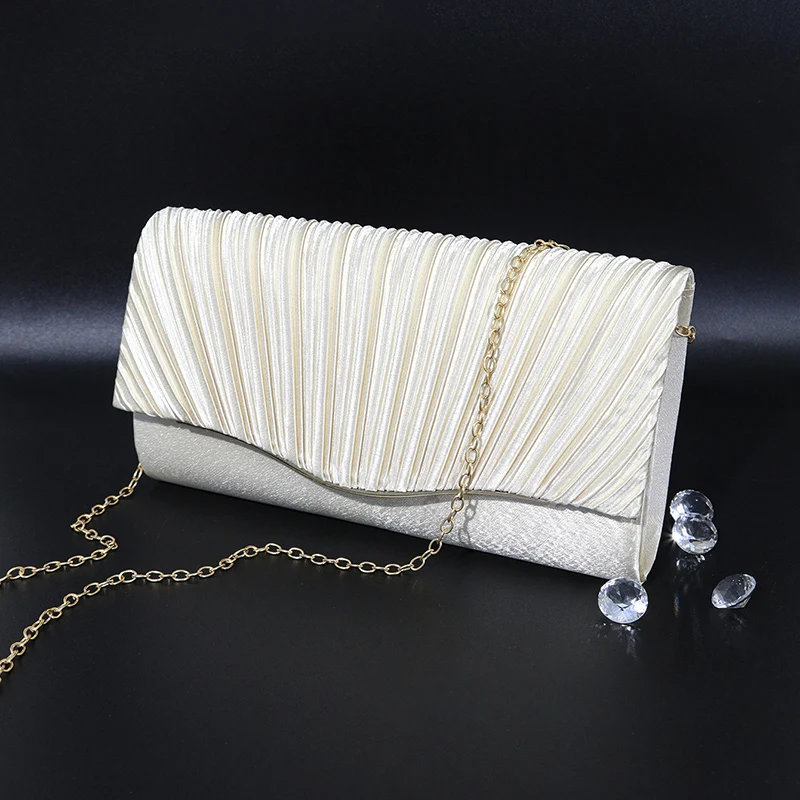 Новая элегантная вечерняя сумка с металлическими украшениями, плиссированная вечерняя сумка, роскошное женское свадебное платье, кошелек-клатч, вечерние сумки на плечо с цепочкой 
Новая элегантная вечерняя сумка с металлическими украшениями, плиссированная вечерняя сумка, роскошное женское свадебное платье, кошелек-клатч, вечерние сумки на плечо с цепочкой