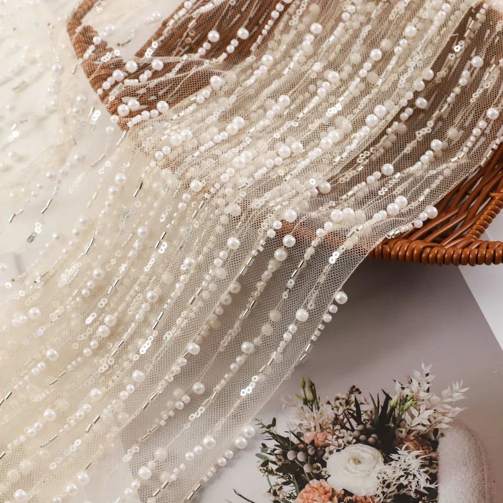 Heavy-duty embroidery lace fabric with sequins, beads, and tube beads for wedding dresses, evening gowns, sewing fabric
Heavy-duty embroidery lace fabric with sequins, beads, and tube beads for wedding dresses, evening gowns, sewing fabric