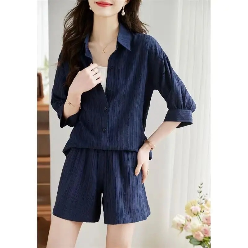 Fashion Lapel Button Solid Color Casual Short Sets Women Clothing 2025 Summer New Loose Korean Elastic High Waist Matching Sets
Fashion Lapel Button Solid Color Casual Short Sets Women Clothing 2025 Summer New Loose Korean Elastic High Waist Matching Sets