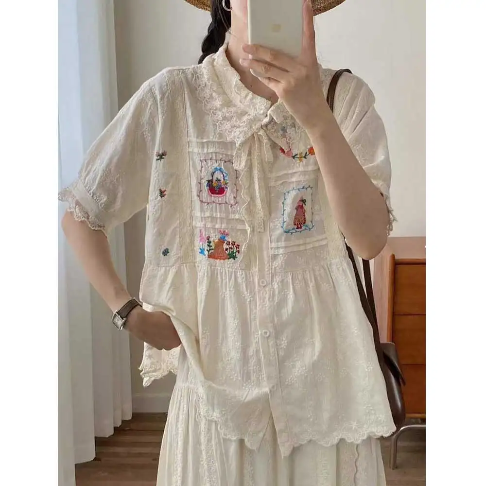 Japanese Sweet Mori Girl Cartoon Embroidery Lace Patchwork Cotton Shirts Women Lace Up Collar Short Sleeve Casual Loose Blouse
Japanese Sweet Mori Girl Cartoon Embroidery Lace Patchwork Cotton Shirts Women Lace Up Collar Short Sleeve Casual Loose Blouse