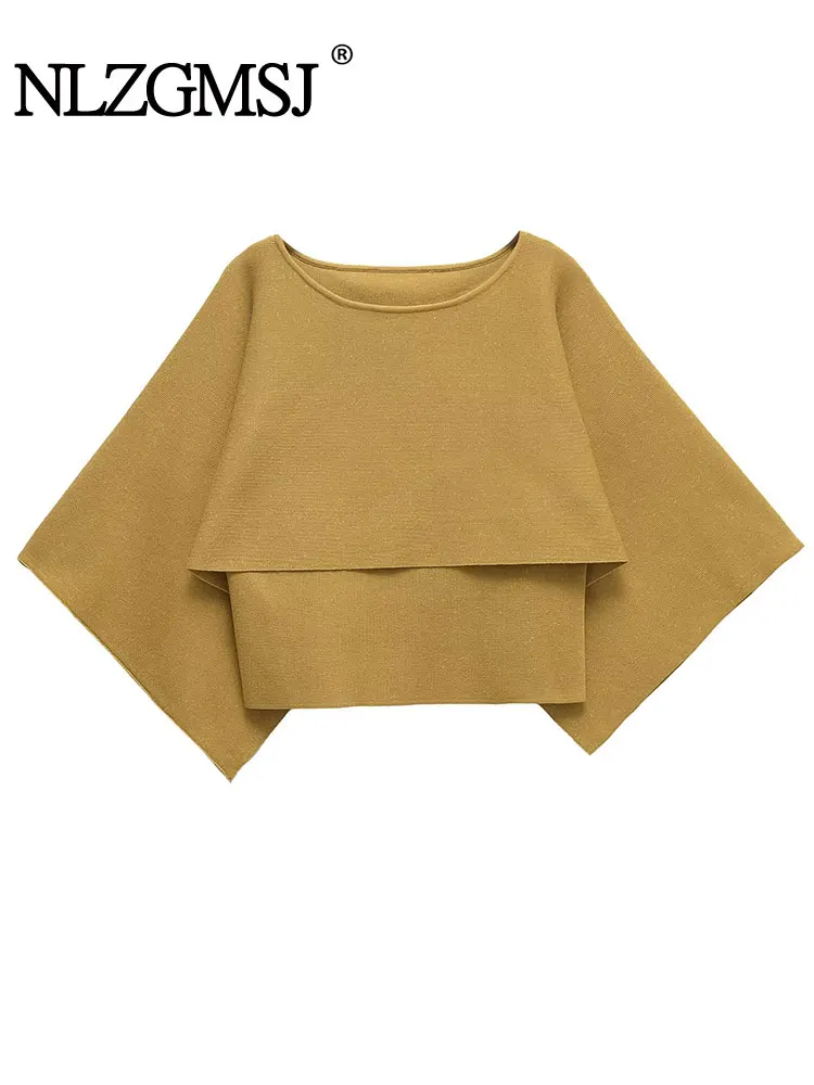 2025 Spring Knitted Women's Fashion Cropped Cape Coats Top Woman KnittedCasual Loose Street Sweaters
2025 Spring Knitted Women's Fashion Cropped Cape Coats Top Woman KnittedCasual Loose Street Sweaters