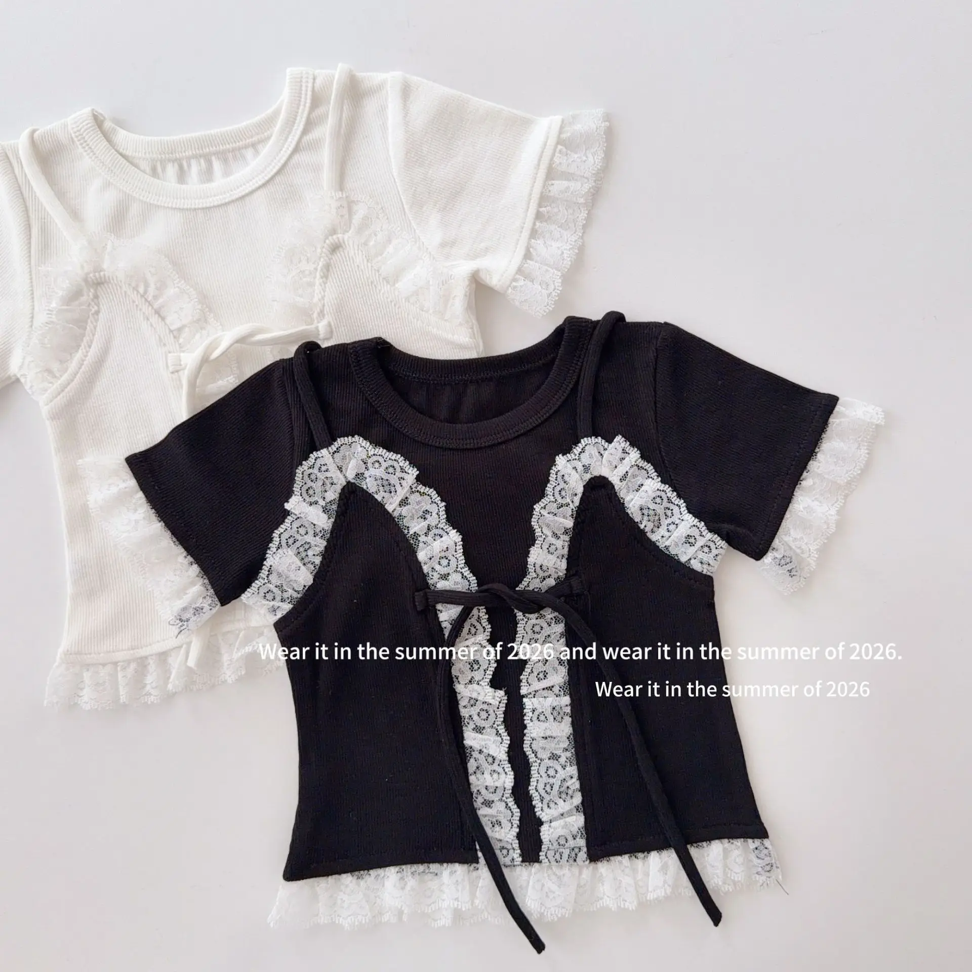Girls Summer New Korean Version Childrens Baby Fake Two Piece Lace Lace Short Sleeved T Shirt Top
Girls Summer New Korean Version Childrens Baby Fake Two Piece Lace Lace Short Sleeved T Shirt Top