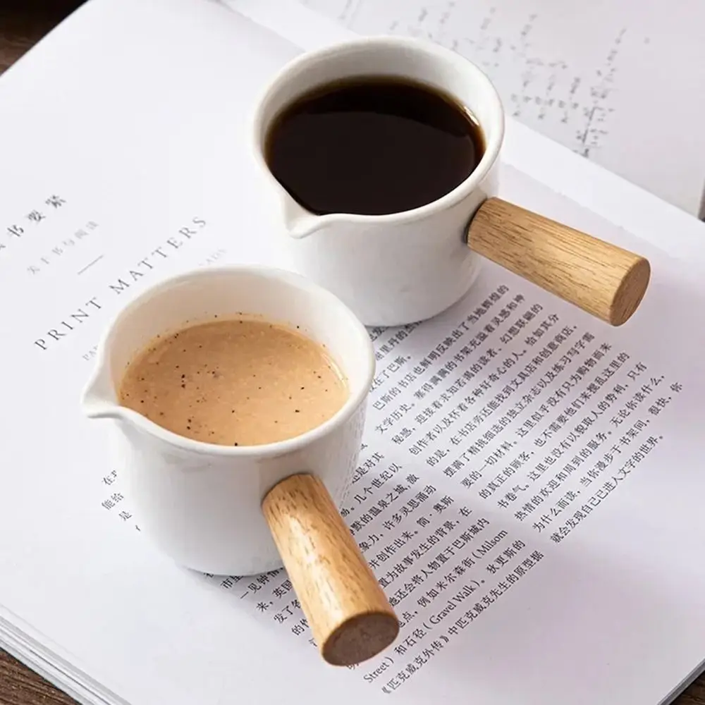 Wooden Handle Milk Frothing Cup Pointed Mouth Stackable Small Ceramics Milk Pot Multi-use Comfortable Grip Creamer Pitcher
Wooden Handle Milk Frothing Cup Pointed Mouth Stackable Small Ceramics Milk Pot Multi-use Comfortable Grip Creamer Pitcher