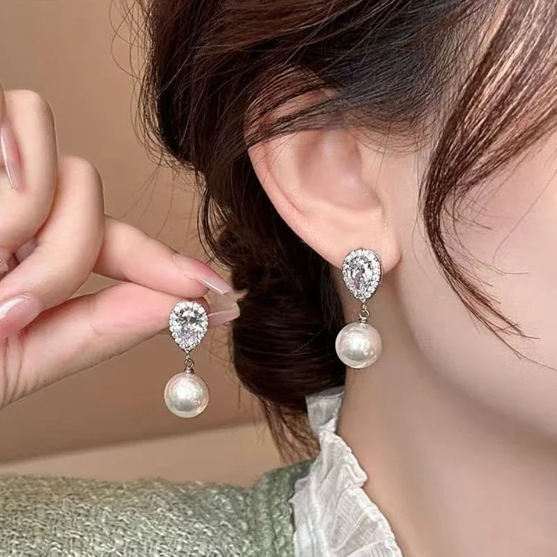 925 Sterling Silver Chic Zircon Water Droplet Pearl Tassel Drop Earring for Women Fine Jewelry High Luxury Vintage Accessories
925 Sterling Silver Chic Zircon Water Droplet Pearl Tassel Drop Earring for Women Fine Jewelry High Luxury Vintage Accessories