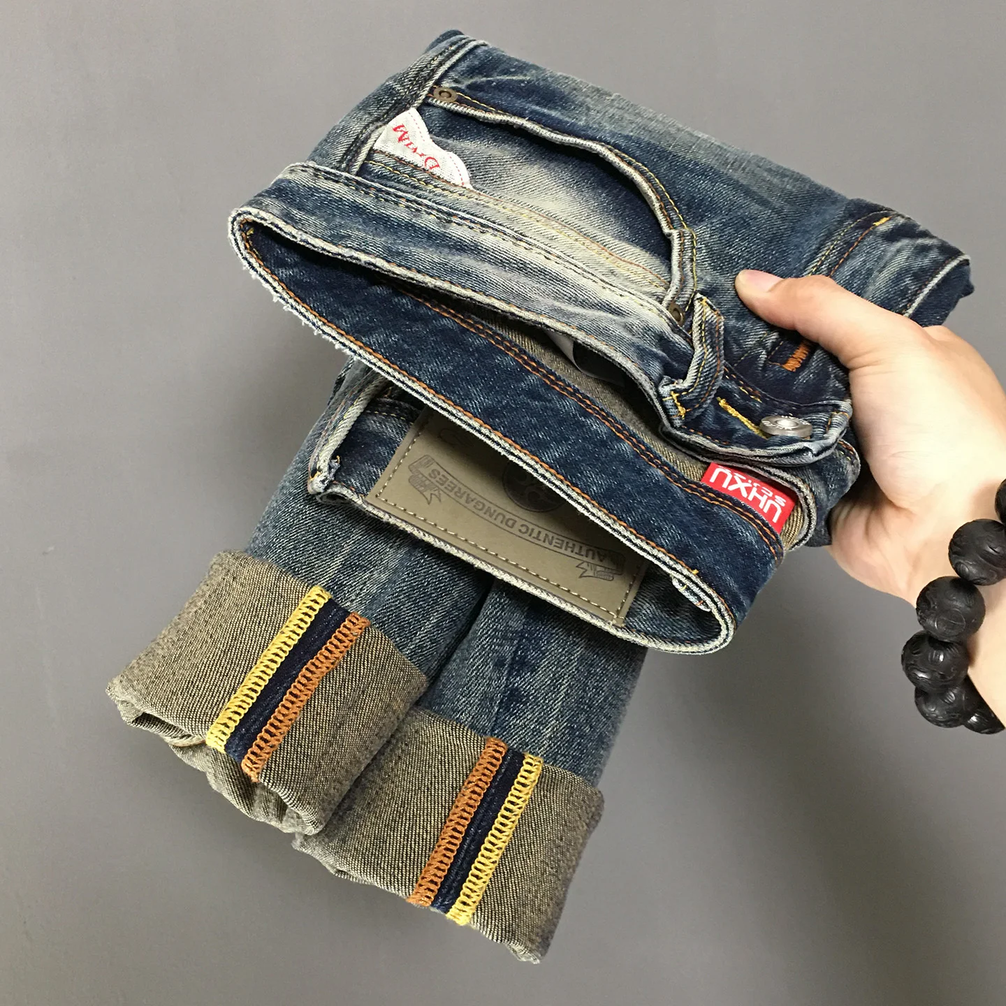 Высококачественные осенне-зимние тяжелые эластичные джинсы для мужчин, потертые потертые прямые брюки в американском стиле ретро
Высококачественные осенне-зимние тяжелые эластичные джинсы для мужчин, потертые потертые прямые брюки в американском стиле ретро