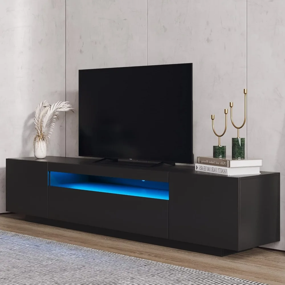 Modern TV Stand for TVs up to 80 Inches with LED Lights, Entertainment Center with lockers and Open Shelf, Black
Modern TV Stand for TVs up to 80 Inches with LED Lights, Entertainment Center with lockers and Open Shelf, Black