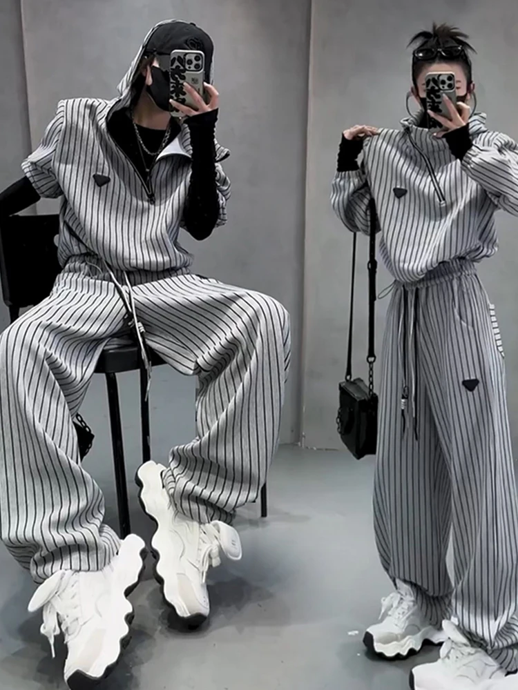 European 2025 Spring and Autumn new striped sportswear set women's hooded sweatshirt wide leg pants fashion casual two-piece set
European 2025 Spring and Autumn new striped sportswear set women's hooded sweatshirt wide leg pants fashion casual two-piece set