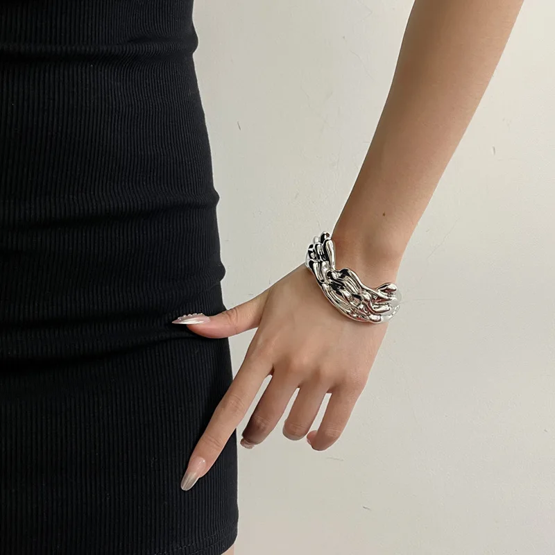 European and American Minimalist Irregular Metal Cold Wave Pattern Element Ring Open Bracelet
European and American Minimalist Irregular Metal Cold Wave Pattern Element Ring Open Bracelet