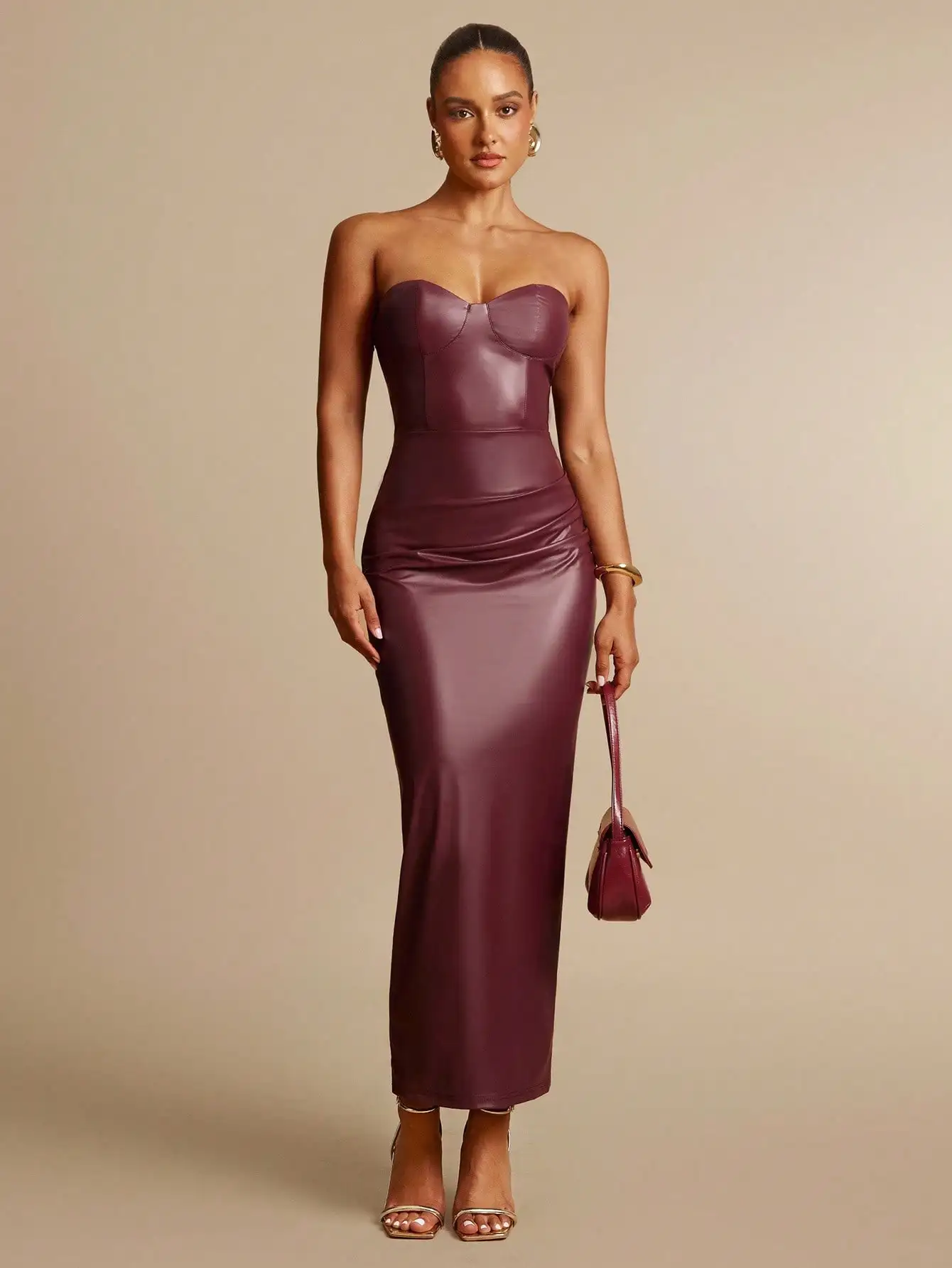 Burgundy Faux Leather Strapless Bustier Midi Dress with Ruched Detail
Burgundy Faux Leather Strapless Bustier Midi Dress with Ruched Detail