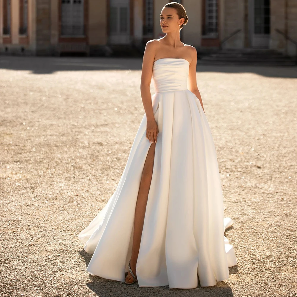 Classic A-Line Strapless Wedding Dress with Side Slit High Quality Customized Pleats Satin Chapel Train Civil Bridal Gowns
Classic A-Line Strapless Wedding Dress with Side Slit High Quality Customized Pleats Satin Chapel Train Civil Bridal Gowns