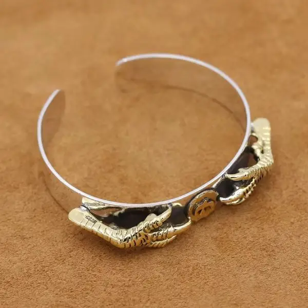 S925 sterling silver niello jewelry simple double gold eagle claw men's domineering Flying Eagle opening bracelet
S925 sterling silver niello jewelry simple double gold eagle claw men's domineering Flying Eagle opening bracelet