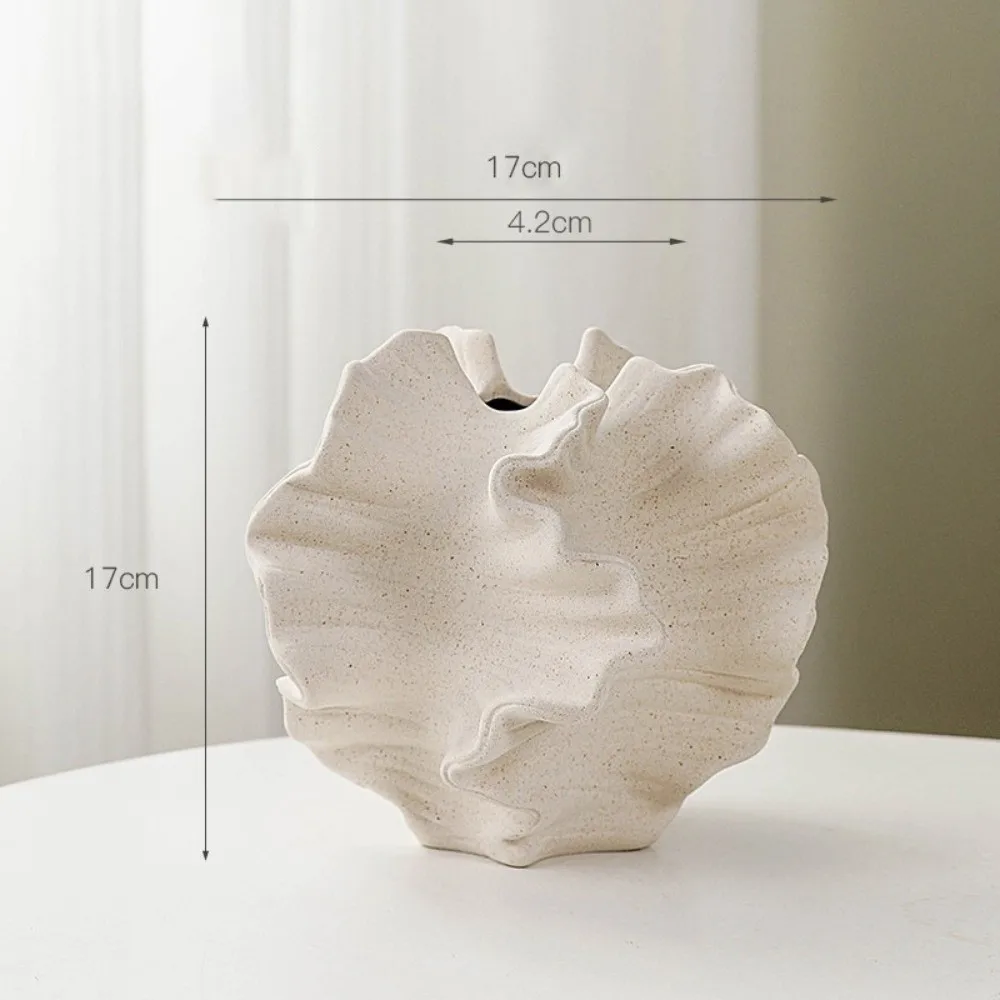 Simple Matte Texture Minimalist Mirage Vase Wavy Geometric Nordic Vase Petal Shape Ceramic Vase Flower Arrangement
Simple Matte Texture Minimalist Mirage Vase Wavy Geometric Nordic Vase Petal Shape Ceramic Vase Flower Arrangement
