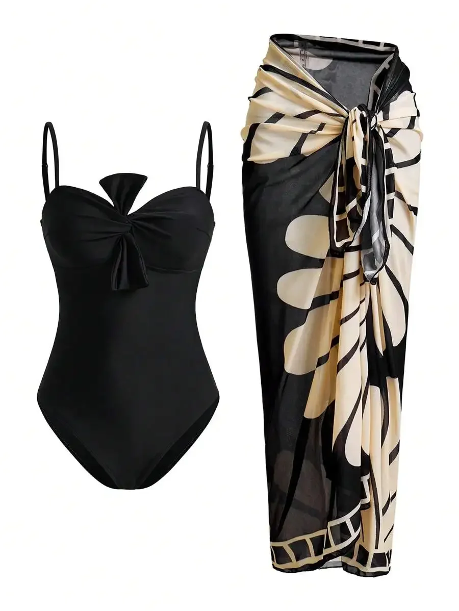 Womens Black Knot Front One Piece Swimsuit With Abstract Print Sarong Cover Up
Womens Black Knot Front One Piece Swimsuit With Abstract Print Sarong Cover Up