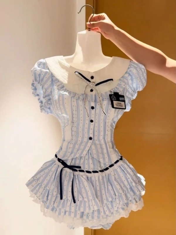 Sweet School Girl Sle Doll Collar Bubble Sve irt Top High Waist Polka Dot Ruffle Skirt Set Women's Faion Ensemble
Sweet School Girl Sle Doll Collar Bubble Sve irt Top High Waist Polka Dot Ruffle Skirt Set Women's Faion Ensemble