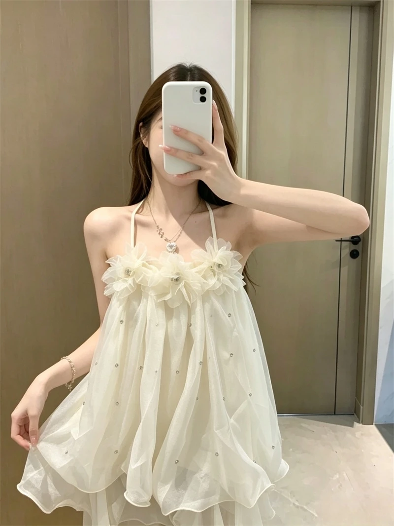 Summer Women's Loose Fit Sleeveless Chiffon Tank Top with 3D Flower Design Gentle Wind Style Outerwear White Color
Summer Women's Loose Fit Sleeveless Chiffon Tank Top with 3D Flower Design Gentle Wind Style Outerwear White Color