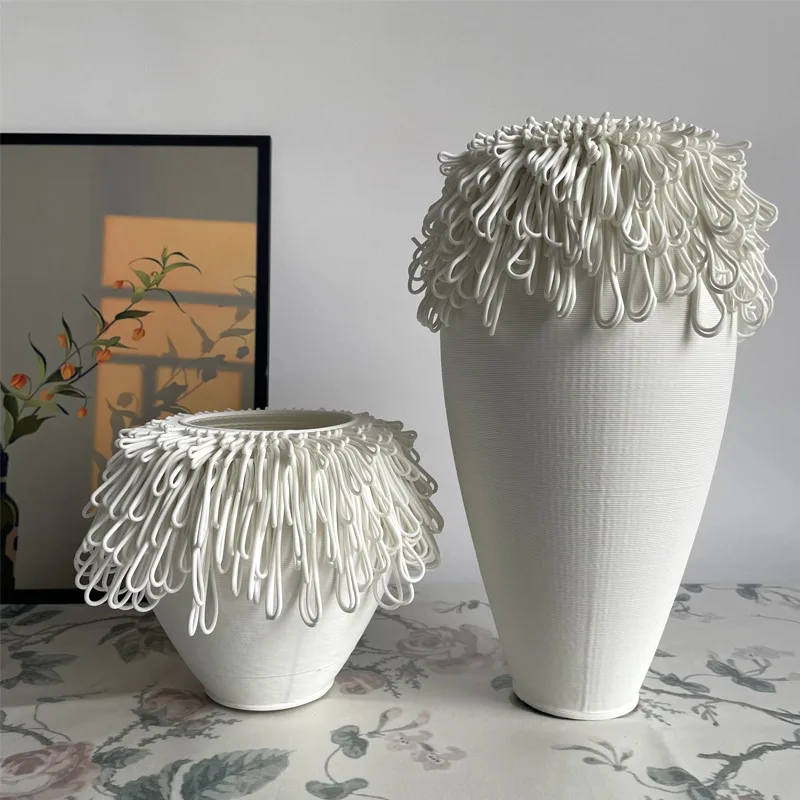 Modern simple and creative 3D white ceramic vase guest restaurant home model room soft decoration advanced flower device ornamen
Modern simple and creative 3D white ceramic vase guest restaurant home model room soft decoration advanced flower device ornamen