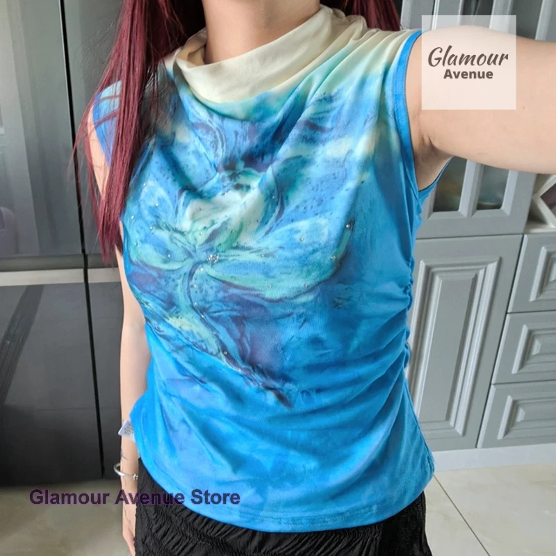 Summer new high-grade blue flowers dizzy clothes French thin temperament fashion unique beautiful coat. tank top women
Summer new high-grade blue flowers dizzy clothes French thin temperament fashion unique beautiful coat. tank top women