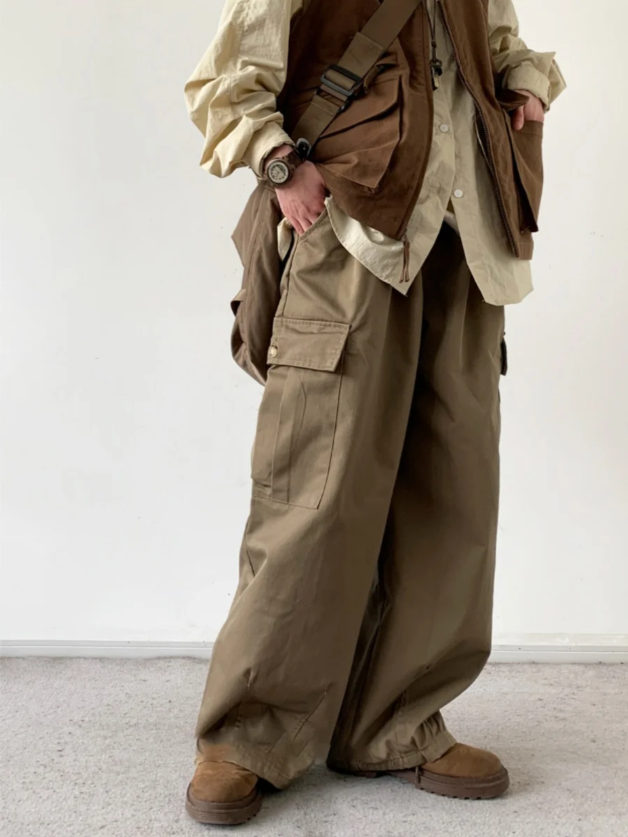 Мужские брюки-карго в японском ретро-стиле, базовые рабочие брюки-парашютисты, свободные повседневные длинные брюки с множеством карманов
Мужские брюки-карго в японском ретро-стиле, базовые рабочие брюки-парашютисты, свободные повседневные длинные брюки с множеством карманов