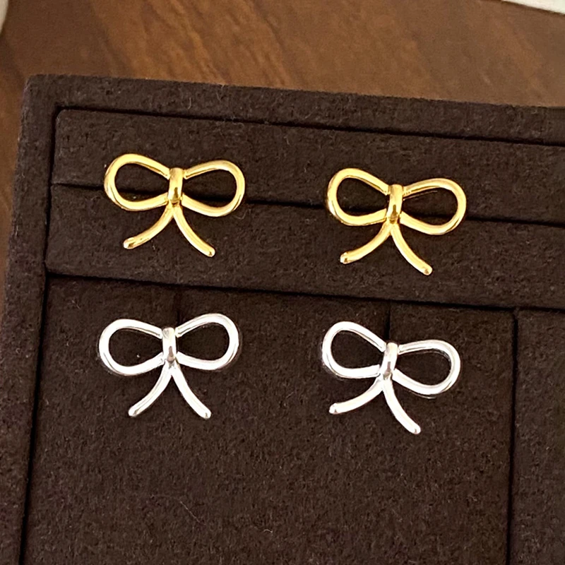 PONYKISS 925 Sterling Silver 18K Gold Mini Hollow Bowknot Stud Earrings for Women Minimalist Cute Fine Jewelry Accessories
PONYKISS 925 Sterling Silver 18K Gold Mini Hollow Bowknot Stud Earrings for Women Minimalist Cute Fine Jewelry Accessories