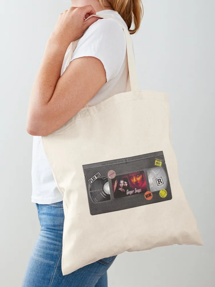 Ginger Snaps - VHS Tote Bag eco pack Shopping bags Candy bags women bag
Ginger Snaps - VHS Tote Bag eco pack Shopping bags Candy bags women bag