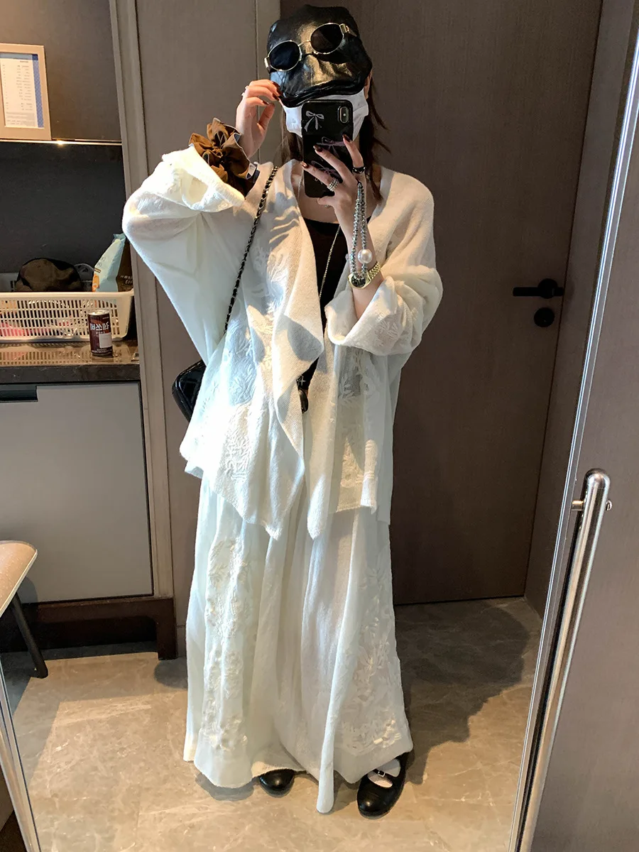Spring women's casual solid color heavy jacquard embroidery knitted cardigan elastic high waisted skirt set
Spring women's casual solid color heavy jacquard embroidery knitted cardigan elastic high waisted skirt set