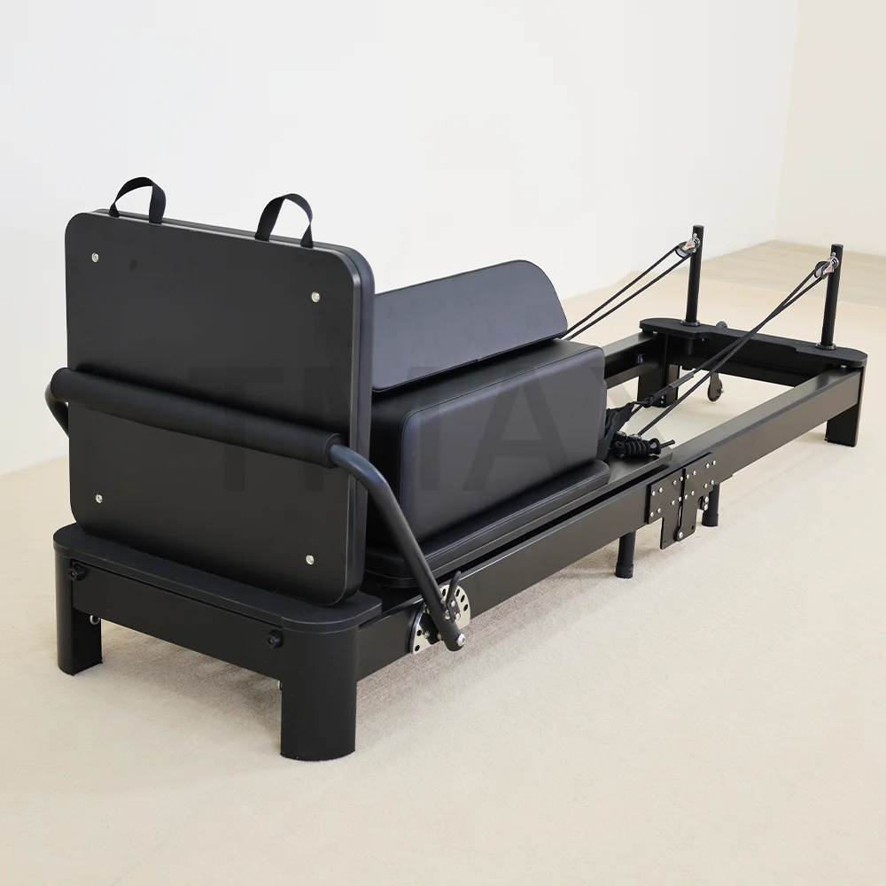 Бренд Tmax, хит продаж, складной черный алюминиевый реформатор для пилатеса, домашний складной пилатес-реформер
Бренд Tmax, хит продаж, складной черный алюминиевый реформатор для пилатеса, домашний складной пилатес-реформер