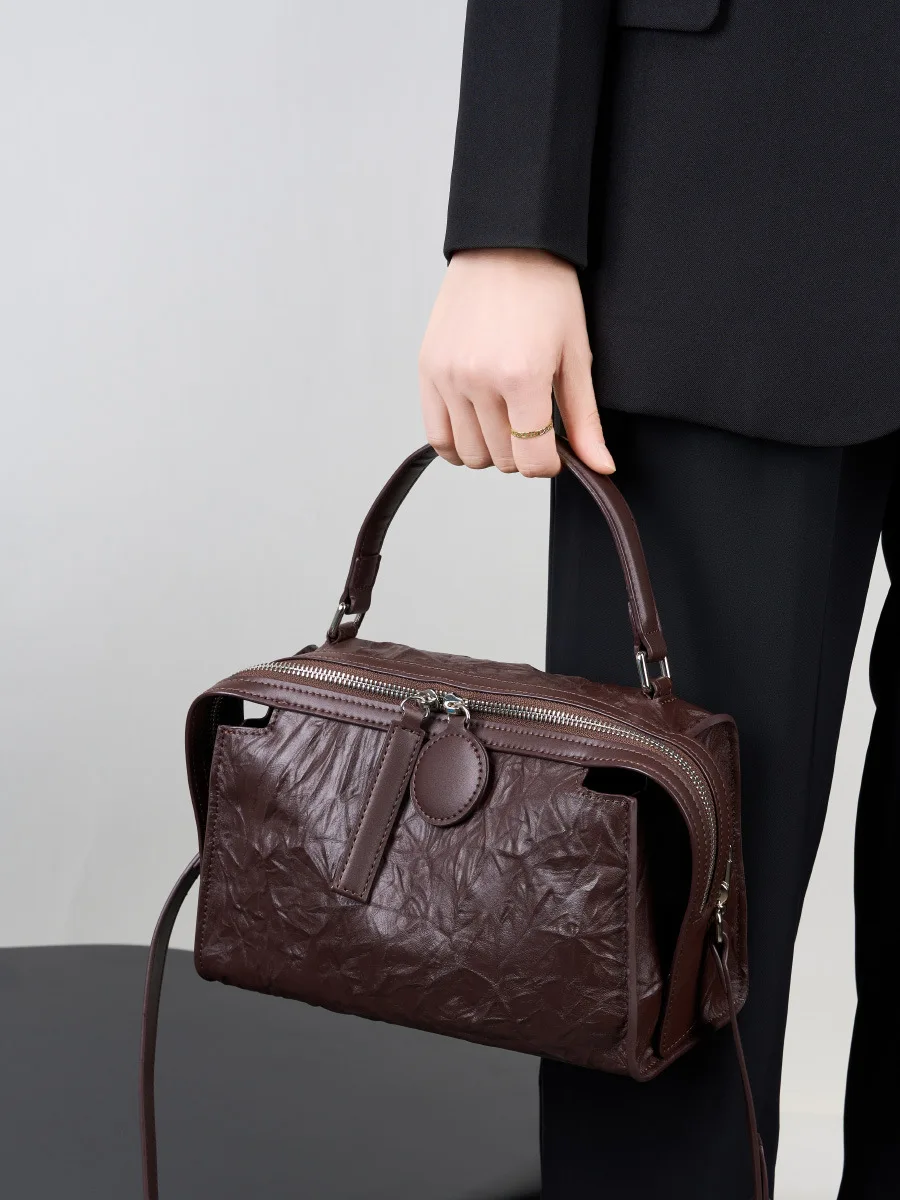 Boston bag handbag 2025 new fashion one-shoulder cross-slide bag genuine leather women's bag
Boston bag handbag 2025 new fashion one-shoulder cross-slide bag genuine leather women's bag