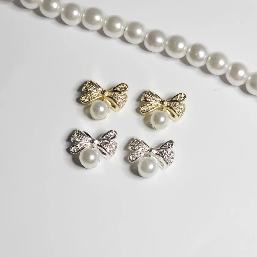 10pcs/lot Pearl and Zircon Bow Alloy Nail Art Crystals Jewelry Gems Rhinestone Nails Accessories Supplies Decorations Charms
10pcs/lot Pearl and Zircon Bow Alloy Nail Art Crystals Jewelry Gems Rhinestone Nails Accessories Supplies Decorations Charms