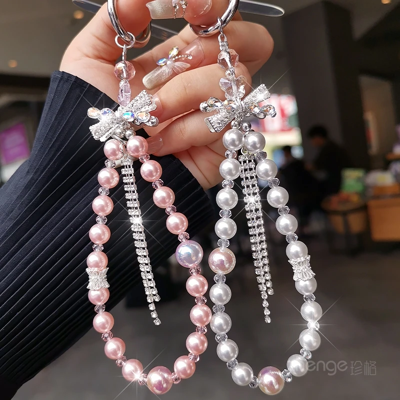 Bling Rhinestone Bow Phone Strap Pearl Beaded Lanyard Fashion Hand Chain for Women
Bling Rhinestone Bow Phone Strap Pearl Beaded Lanyard Fashion Hand Chain for Women
