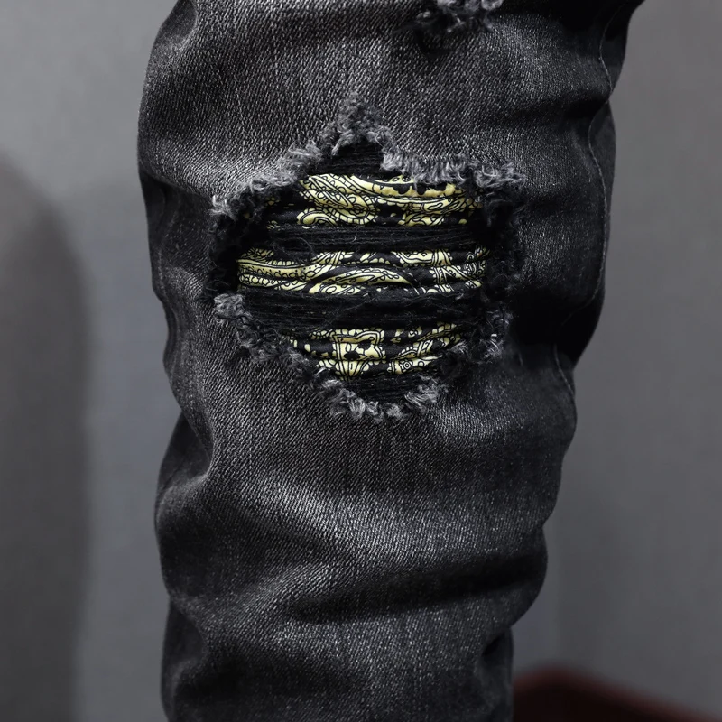 Fashionable new men's jeans retro washed slim fit elastic perforated patch black jeans designer pants Y2K
Fashionable new men's jeans retro washed slim fit elastic perforated patch black jeans designer pants Y2K
