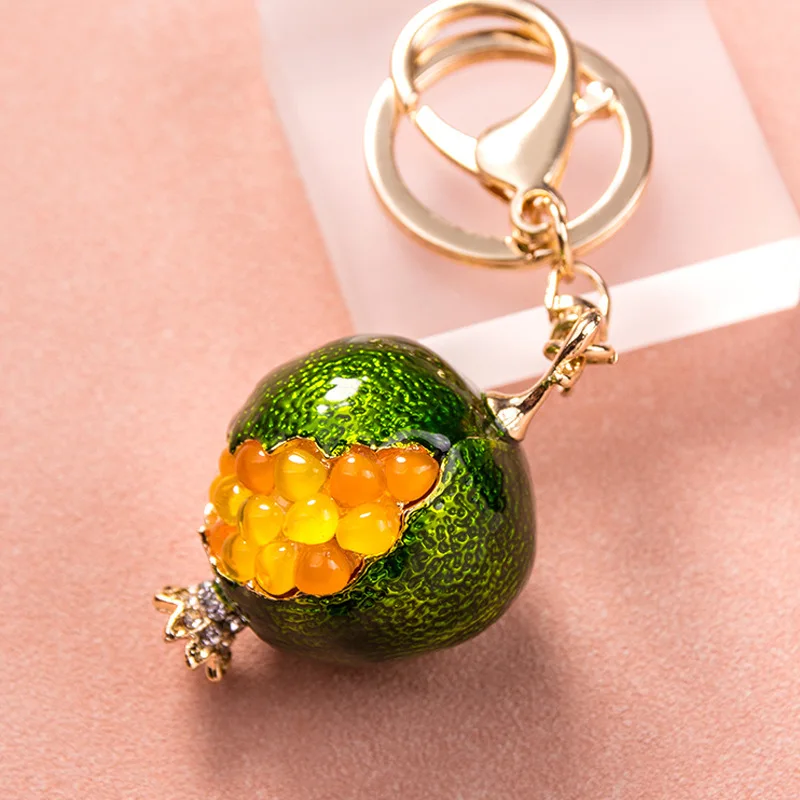 New Creative Crystal Inlaid Pomegranate Car Keychain Cute Bag Pendant Metal Key Ring Party Gift Wholesale
New Creative Crystal Inlaid Pomegranate Car Keychain Cute Bag Pendant Metal Key Ring Party Gift Wholesale
