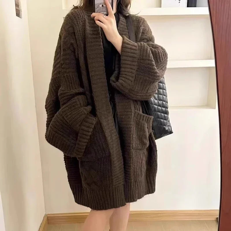 Winter Cardigan Women's Pocket Sweater Korean Loose Knitted Cardigan Casual Solid Knit Jacket Medium Long Thick Autumn
Winter Cardigan Women's Pocket Sweater Korean Loose Knitted Cardigan Casual Solid Knit Jacket Medium Long Thick Autumn