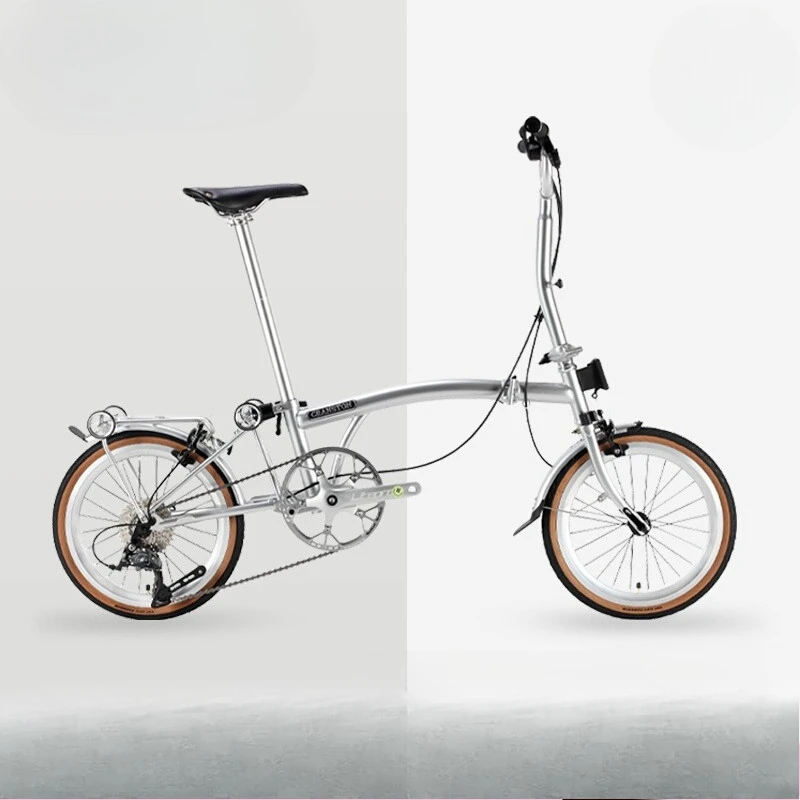 16 inch 9 speed three folding adult ultra light portable urban retro cloth folding bicycle
16 inch 9 speed three folding adult ultra light portable urban retro cloth folding bicycle