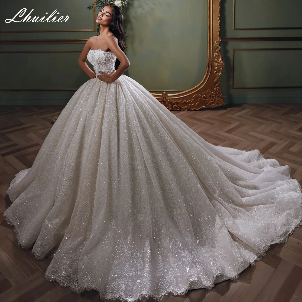 Lhuilier Customized Strapless Ball Gown Lace Wedding Dresses Sleeveless Beaded Bridal Gown with Chapel Train
Lhuilier Customized Strapless Ball Gown Lace Wedding Dresses Sleeveless Beaded Bridal Gown with Chapel Train