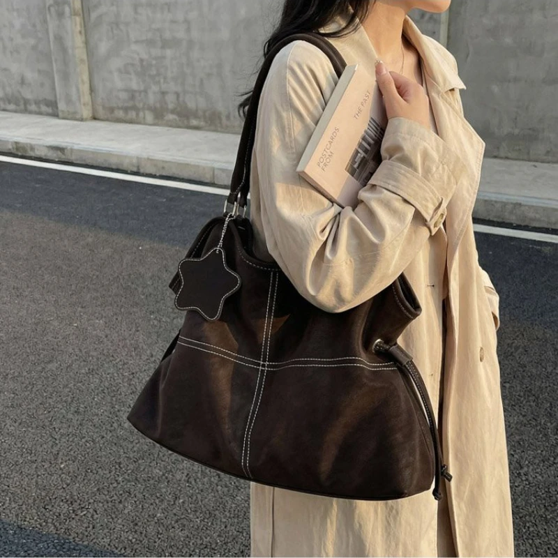 Multi-purpose Shoulder Bag with Drawstring & Star Charm for Women's Everyday School Office Casual Weekend Errands & Daily Use
Multi-purpose Shoulder Bag with Drawstring & Star Charm for Women's Everyday School Office Casual Weekend Errands & Daily Use