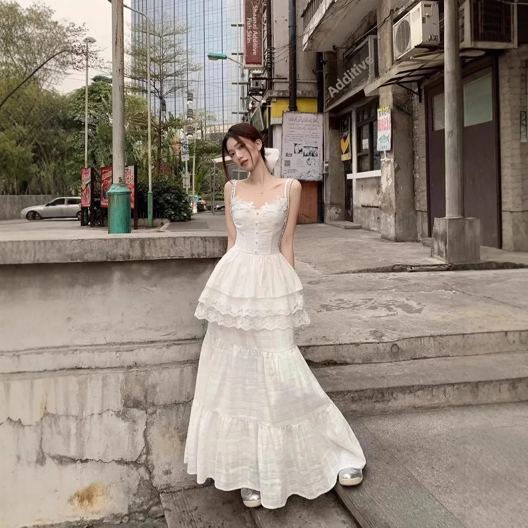 Тонкий дизайн с кружевным сращиванием, жилет с сенсорным ремешком, высокая талия, длинная юбка для тела, женская новинка лета 2025 г.
Тонкий дизайн с кружевным сращиванием, жилет с сенсорным ремешком, высокая талия, длинная юбка для тела, женская новинка лета 2025 г.