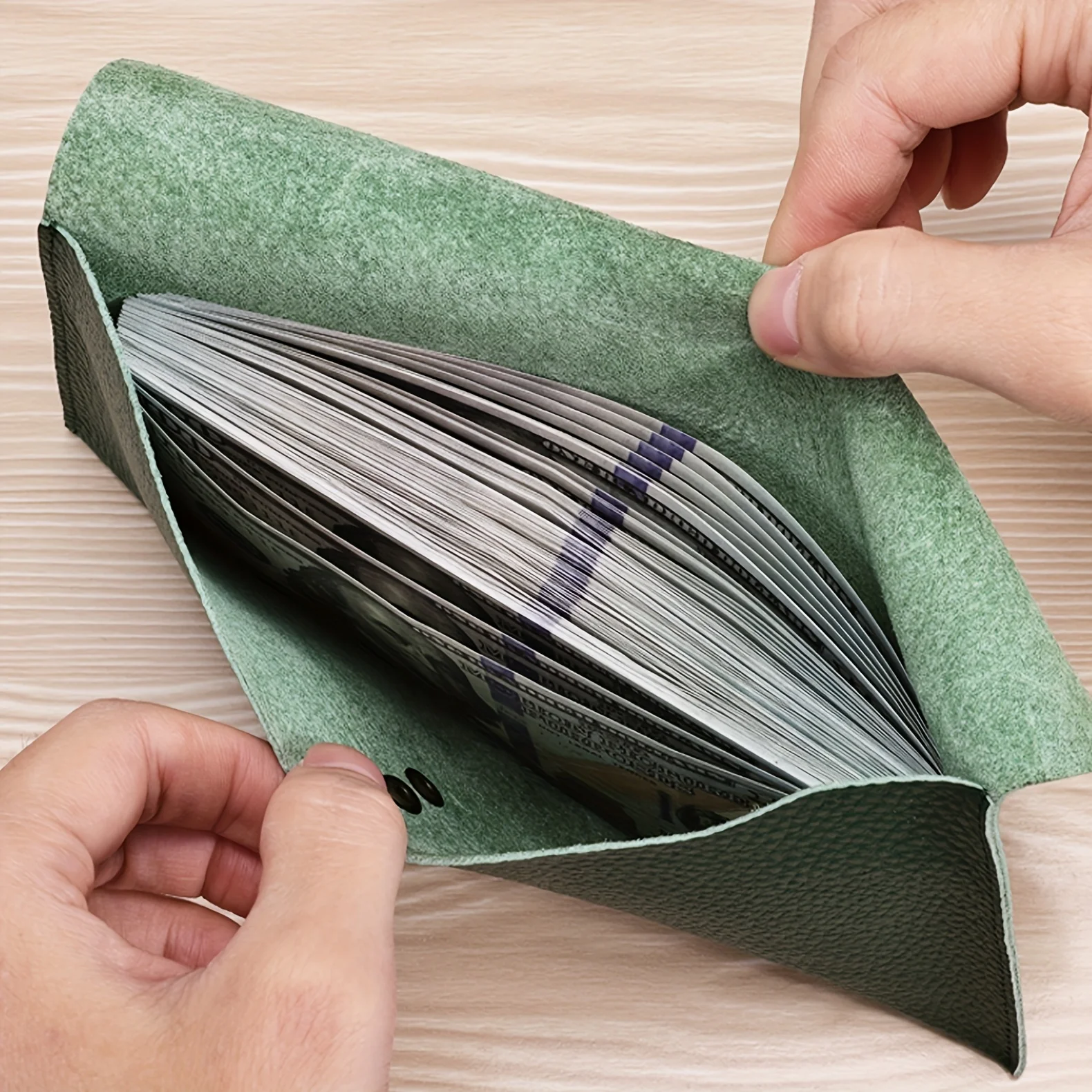 A fashionable and spacious long cash wallet with a unique design, equipped with a beautiful coin pocket made of genuine soft leather.
A fashionable and spacious long cash wallet with a unique design, equipped with a beautiful coin pocket made of genuine soft leather.
