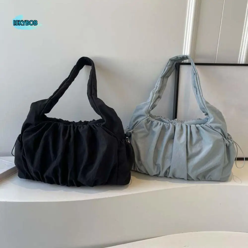 Простая парусиновая сумка на плечо с завязками в корейском стиле, плиссированная сумка через плечо с облаком, большая вместительная повседневная школьная сумка подмышками
Простая парусиновая сумка на плечо с завязками в корейском стиле, плиссированная сумка через плечо с облаком, большая вместительная повседневная школьная сумка подмышками